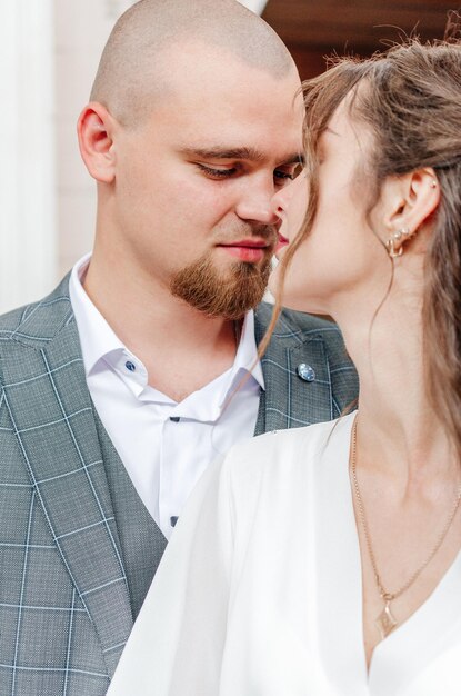 the bride and groom tenderly embrace