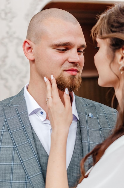 the bride and groom tenderly embrace