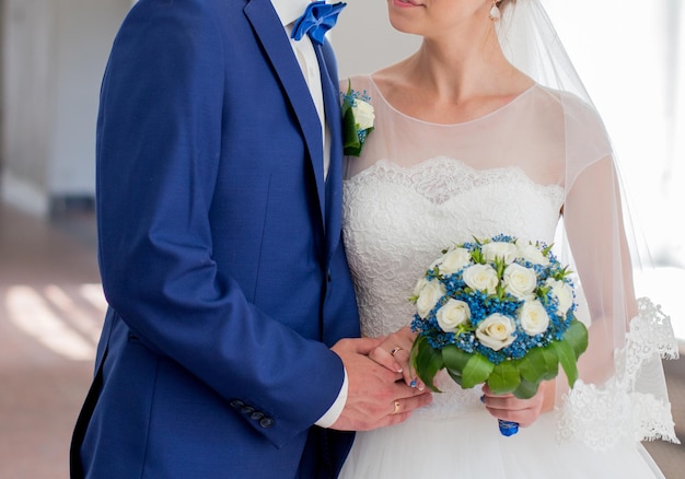 Bride and groom together in a building