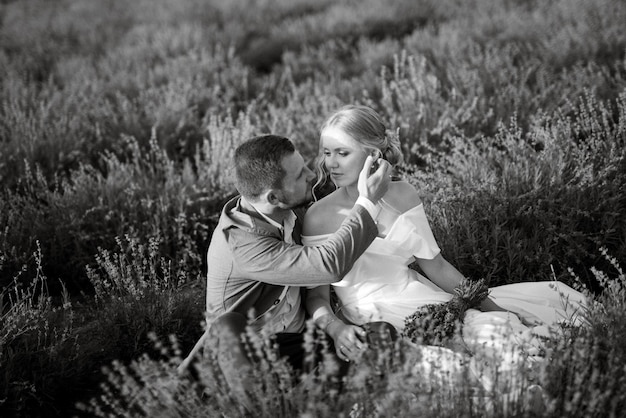 Bride and groom on a walk in the lavender field