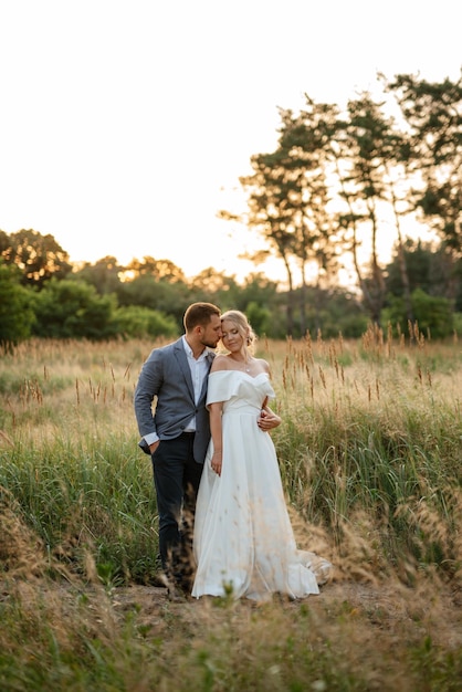 Bride and groom on a walk in the woods