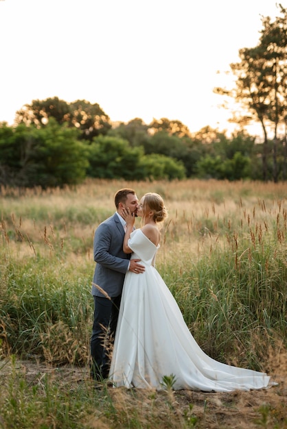 Bride and groom on a walk in the woods