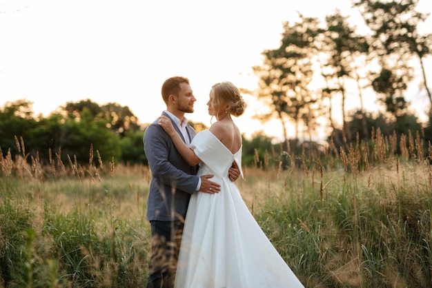 Bride and groom on a walk in the woods