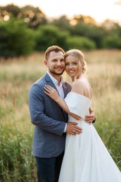 Bride and groom on a walk in the woods