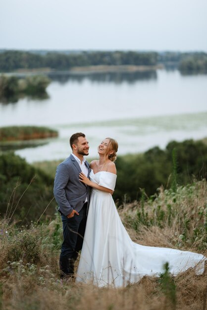 Bride and groom on a walk in the woods