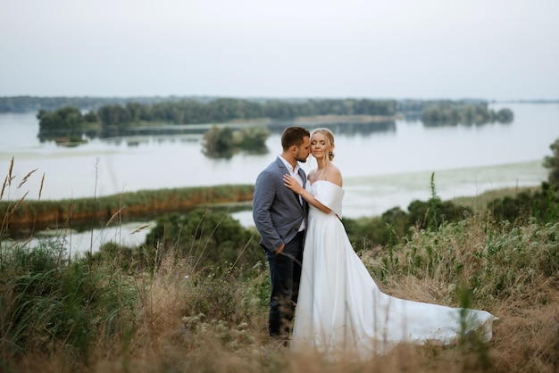 Bride and groom on a walk in the woods