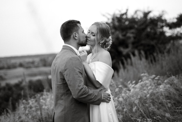 Bride and groom on a walk in the woods