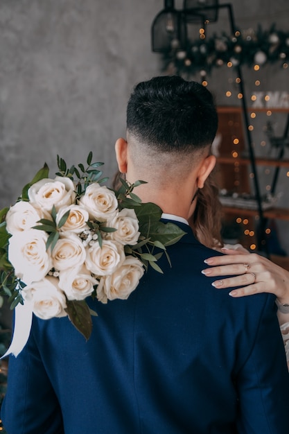 Bride and groom. wedding bouquet. Wedding rings.