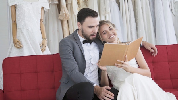 Bride and groom in wedding dress prepare ceremony.