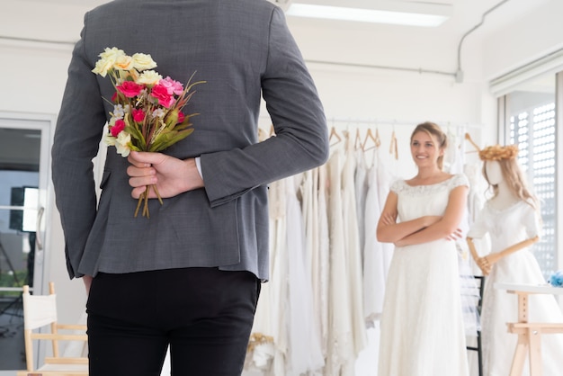 Bride groom in wedding dress in wedding ceremony.