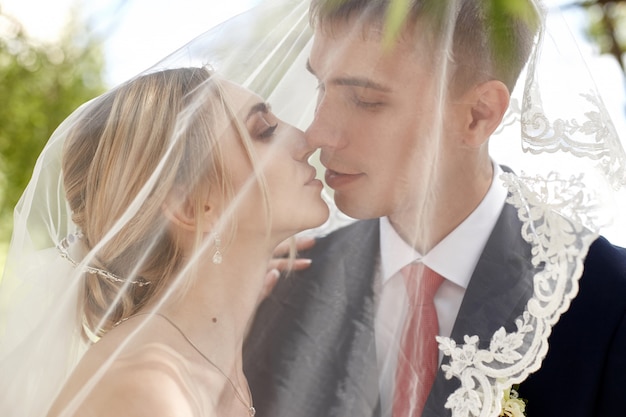 Bride and groom at the wedding in nature