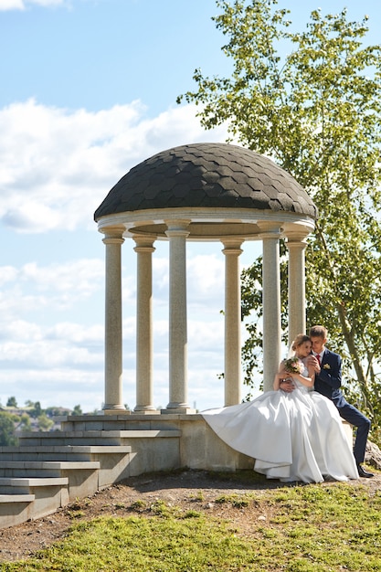 Bride and groom at the wedding in nature