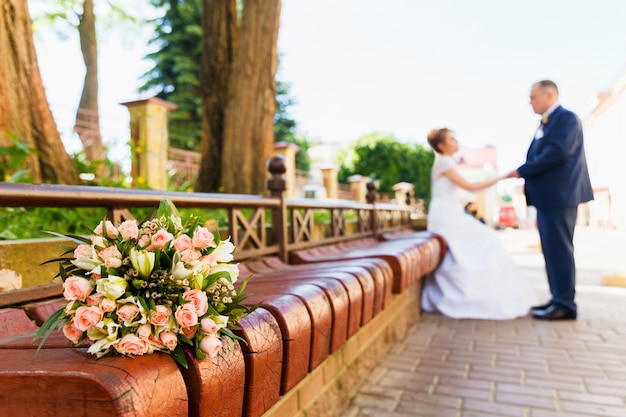 Bride and groom with bridal bouquet