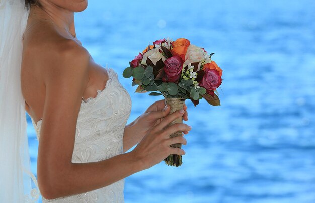 Bride holding flowers