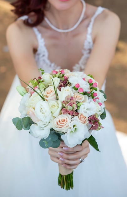 Bride holding flowers