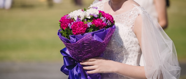 Bride holding wedding bouquet