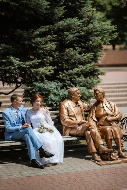 Bride in a light wedding dress to the groom in a blue suit