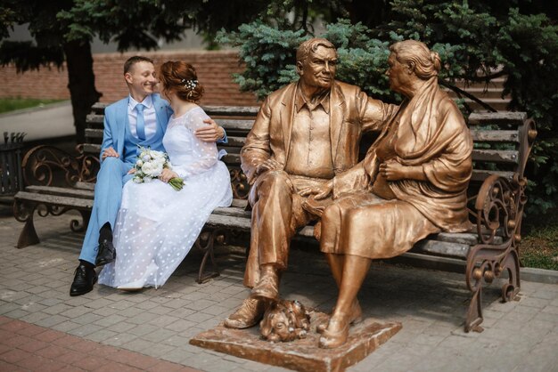 Bride in a light wedding dress to the groom in a blue suit