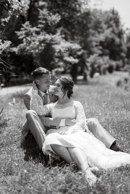 Bride in a light wedding dress to the groom in a blue suit