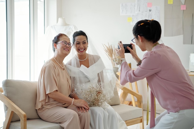 Bride and Mother Posing for Photo