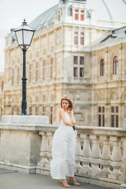 Bride near old building