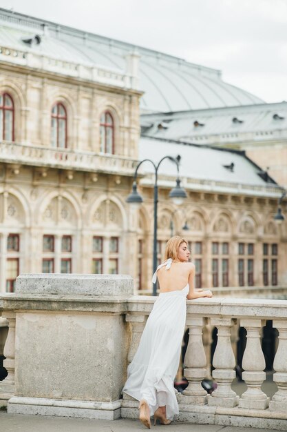 Bride near old building