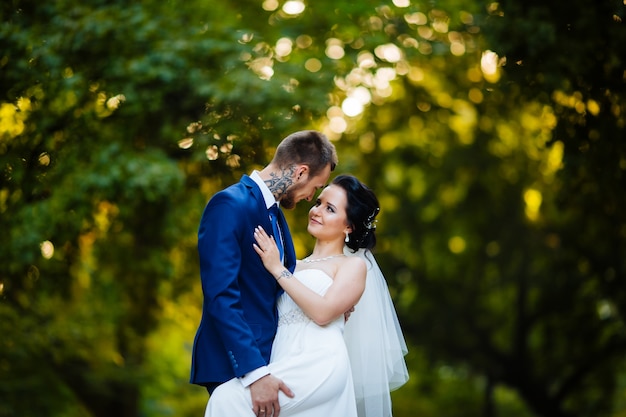 The bride passionately kisses his sweetheart