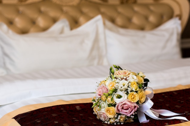 Bride's bouquet on the bed