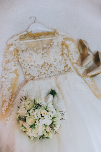 Bride´s dress and bouquet