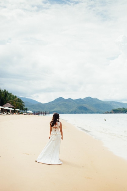 Bride travel beach resort. Sea view and beach in tropics