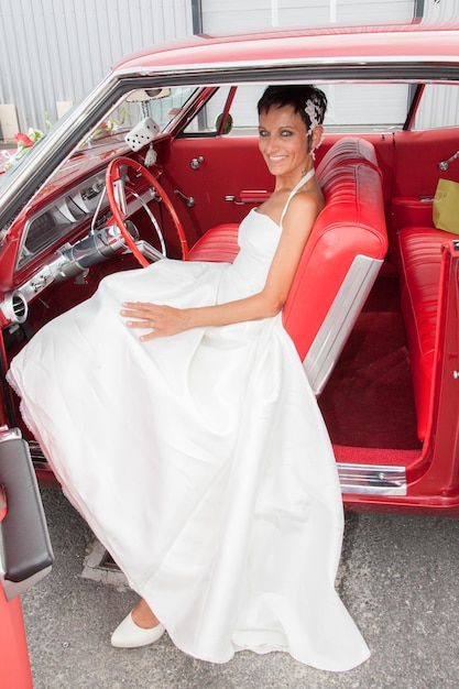 Bride in a vintage car