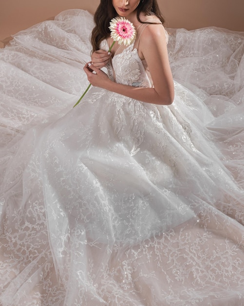 Bride in a wedding dress with a flowers