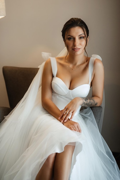 Photo bride in a white dress at the training camp