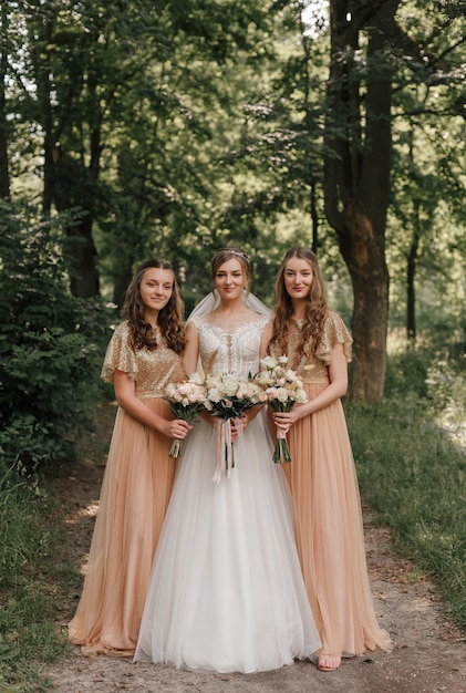 Bride with bridesmaids nature