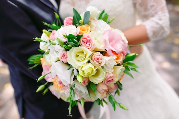 Bride with wedding bouquet.