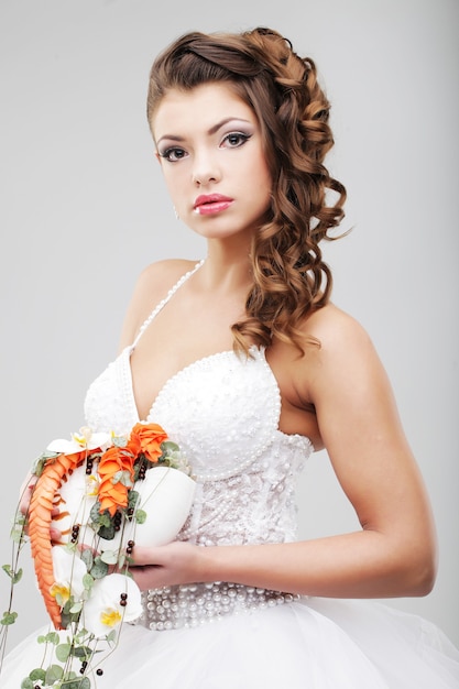 The bride with a wedding bouquet