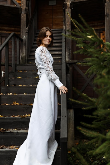 Bride on wooden stairs