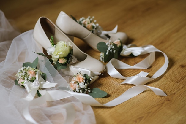 Brides accessories pretarations for wedding day, shoes and buttohole