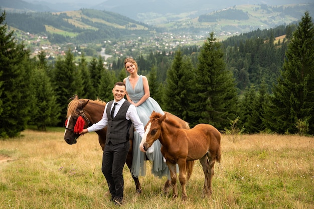 brides on a walk in the mountains