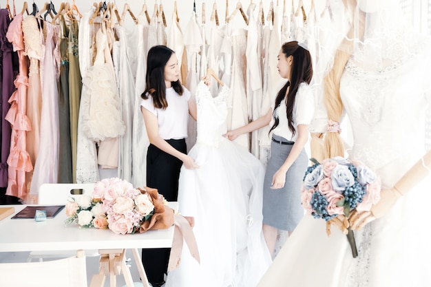 Bridesmaid dress rehearsal at the tailor shop.