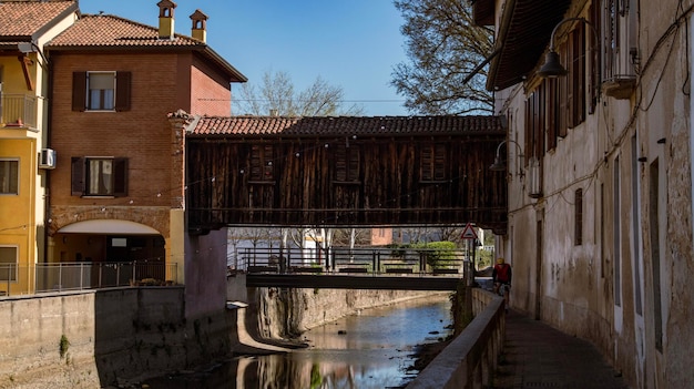 A bridge over a canal in a city