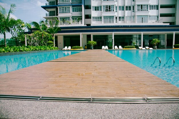 bridge dividing the pool into two parts for children and adults