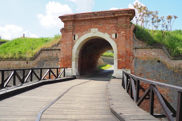 Bridge over the moat in the Petrovaradin Fortress Petrovaradin Novi Sad Serbia Wooden fortifications Hills overgrown fortifications Museum complex of defensive structures