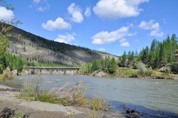 Bridge over the mountain river in Yakutia