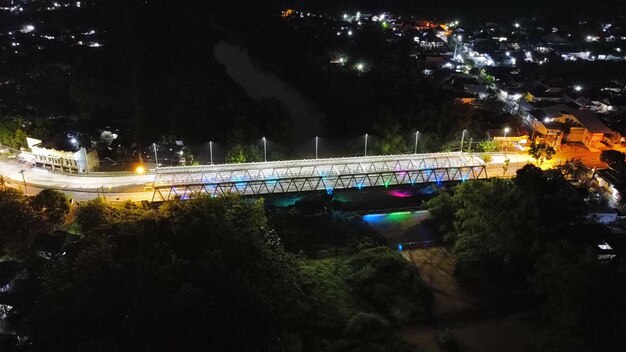 A bridge at night with lights on