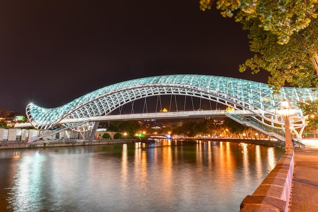 The Bridge of Peace in Tbilisi a pedestrian bridge over the Mtkvari River in Tbilisi Georgia illuminated at night
