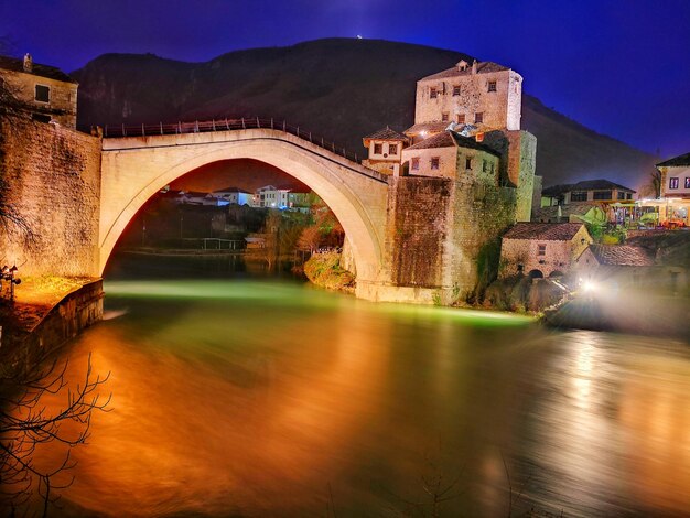 Bridge over river against sky