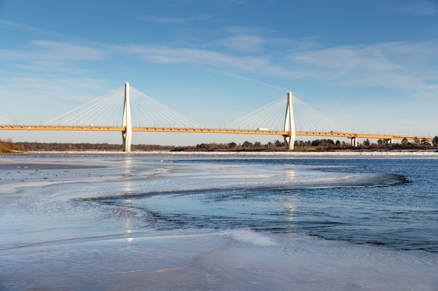 Bridge over river covered with ice