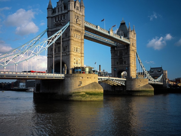 Bridge over river with city in background