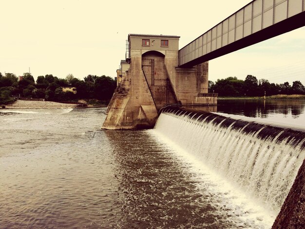 Photo bridge over river